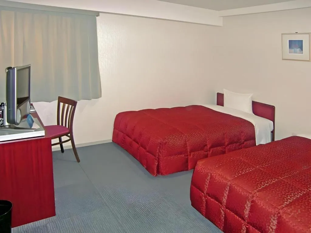 Bed in Spa Land Hotel Naito