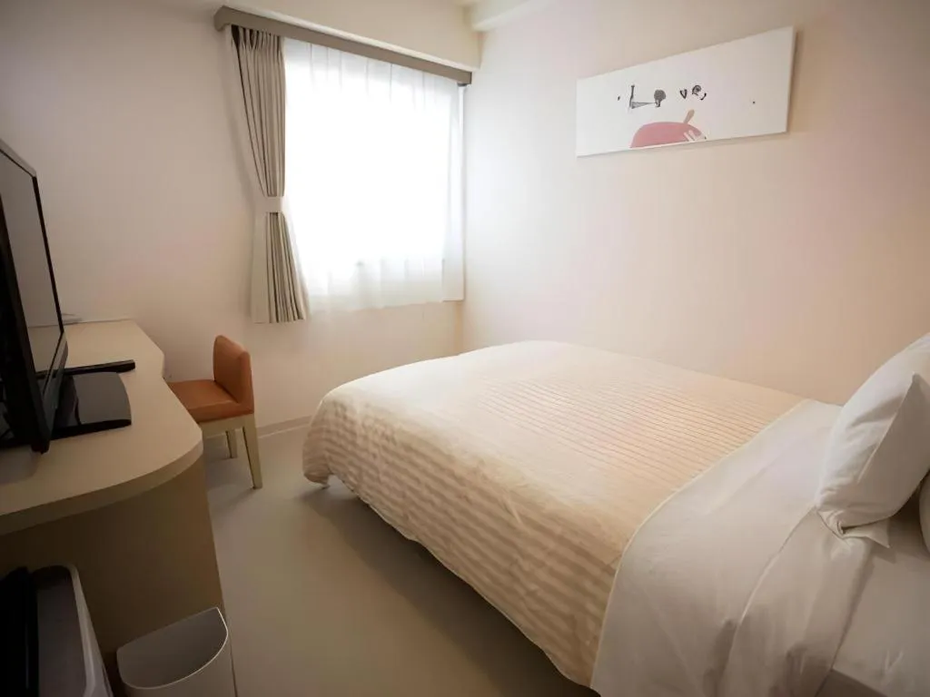 Bed in Spa Land Hotel Naito