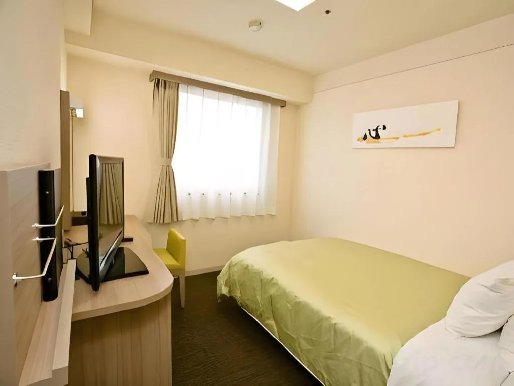 Bed in Spa Land Hotel Naito