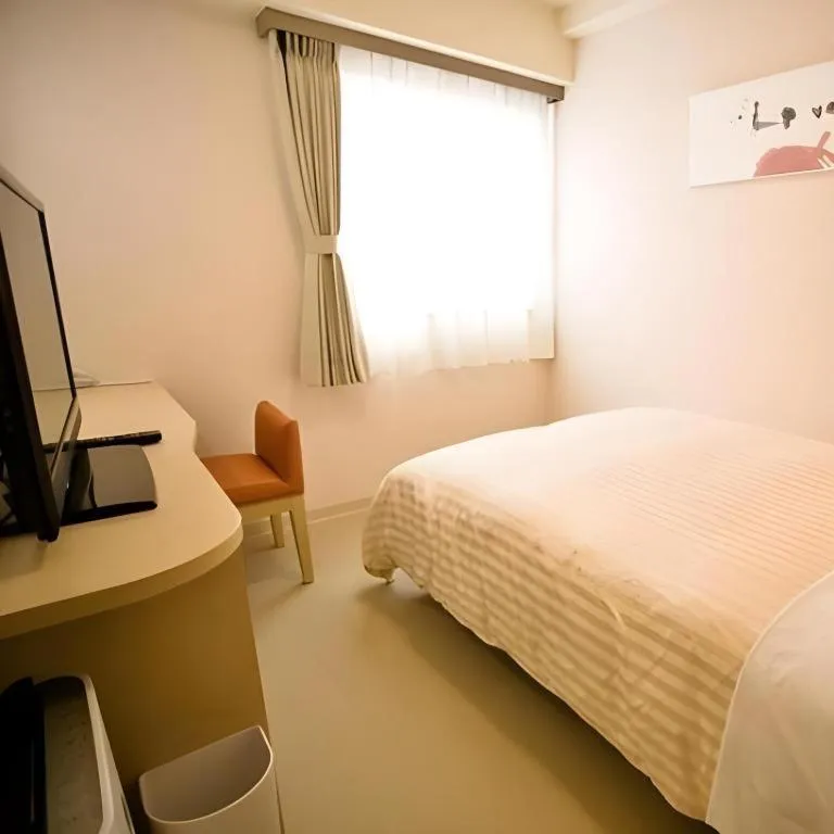 Bed in Spa Land Hotel Naito