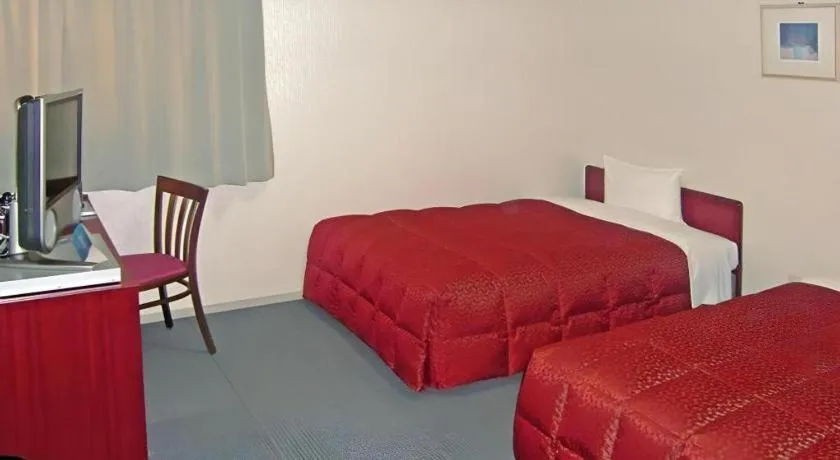 Bed in Spa Land Hotel Naito