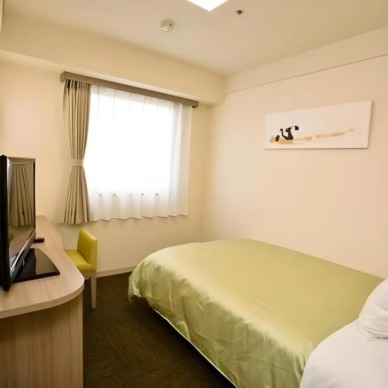 Bed in Spa Land Hotel Naito