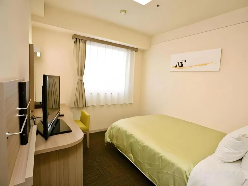 Bed in Spa Land Hotel Naito