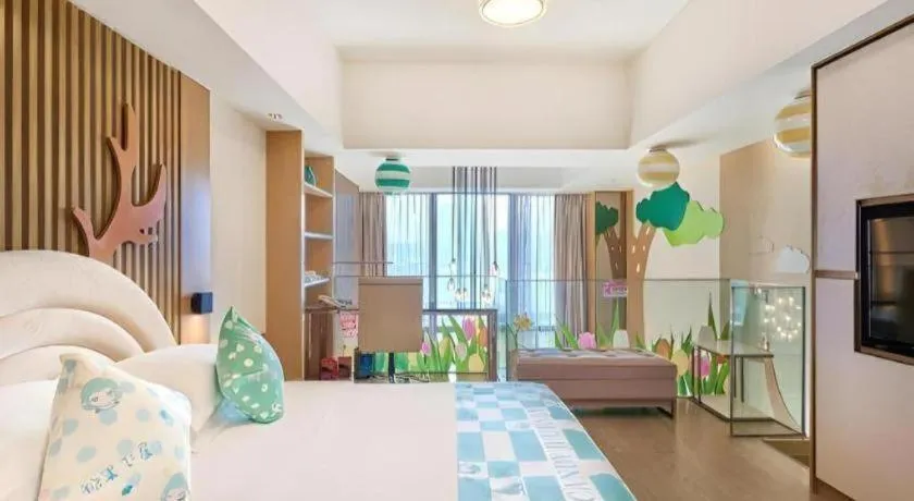 Bed in Huafa Executive Apartment Hotel Zhuhai