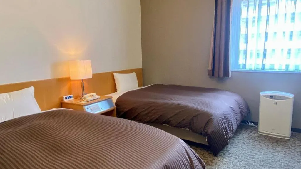 Bed in Hotel Castle Plaza