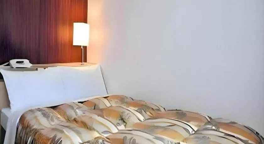 Bed in Hotel Castle Plaza