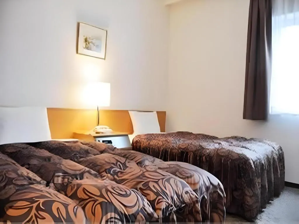 Bed in Hotel Castle Plaza