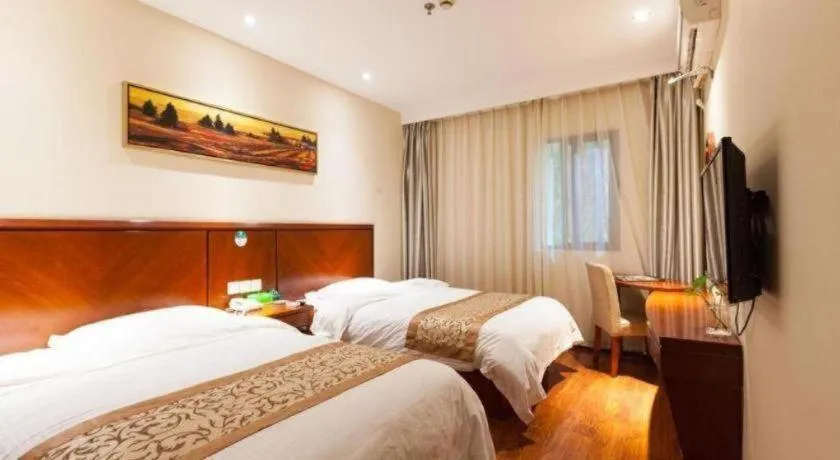 Bed in GreenTree Inn Shanghai Songjiang WanDa Plaza RonGMEi Road Express Hotel
