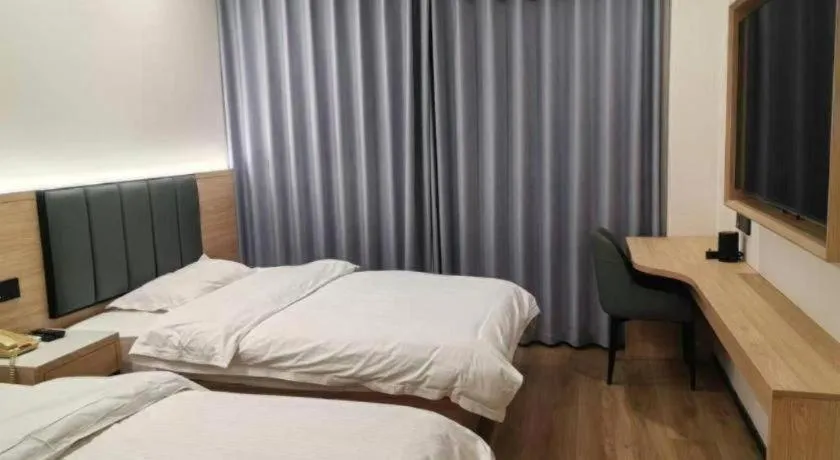 Bed in GreenTree Inn Shanghai Songjiang WanDa Plaza RonGMEi Road Express Hotel