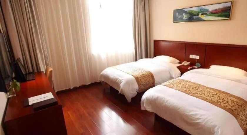 Bed in GreenTree Inn Shanghai Songjiang WanDa Plaza RonGMEi Road Express Hotel