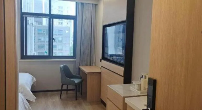 Bed in GreenTree Inn Shanghai Songjiang WanDa Plaza RonGMEi Road Express Hotel