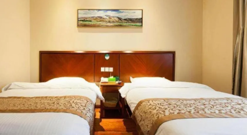 Bed in GreenTree Inn Shanghai Songjiang WanDa Plaza RonGMEi Road Express Hotel