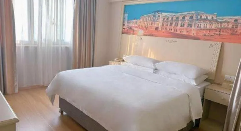 Bed in Vienna Hotel Yangzhou Yangzhou Slender West Lake Wenchangge