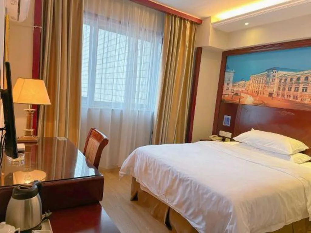 Bed in Vienna Hotel Yangzhou Yangzhou Slender West Lake Wenchangge