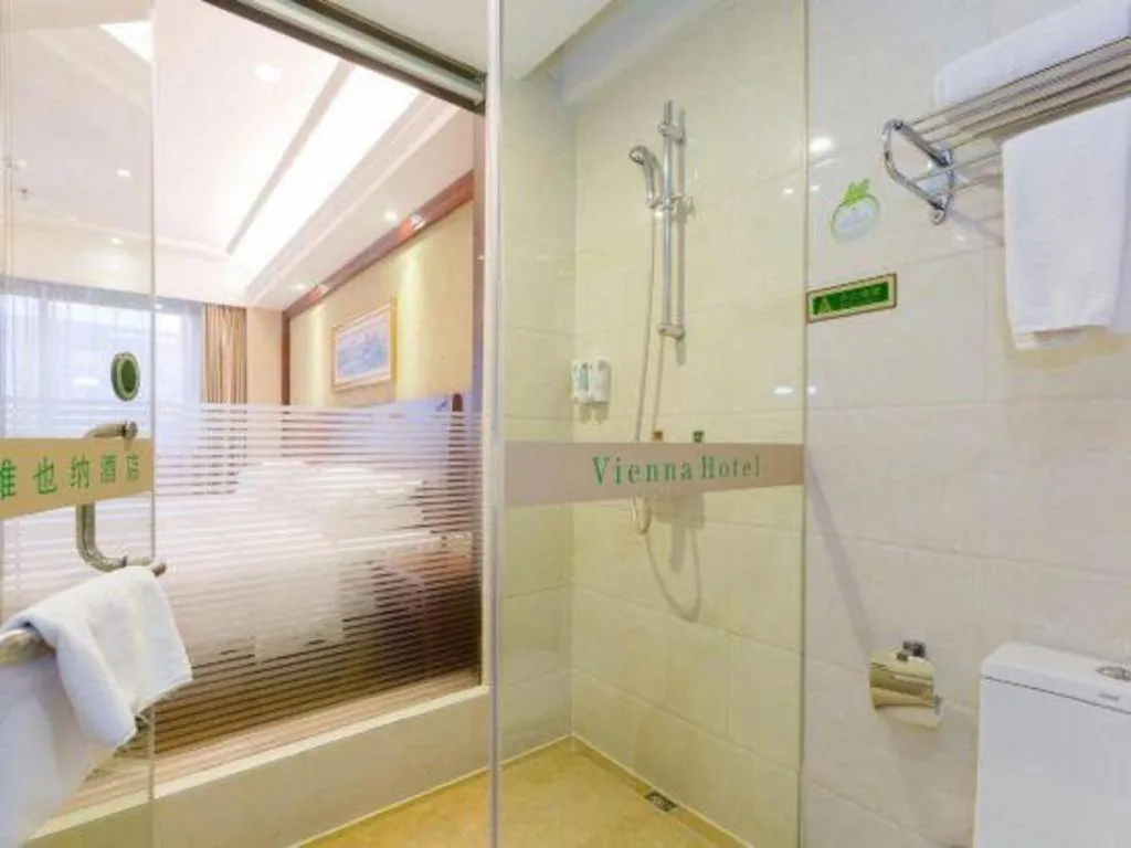 Bed in Vienna Hotel Yangzhou Yangzhou Slender West Lake Wenchangge