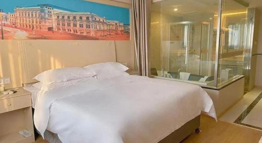 Bed in Vienna Hotel Yangzhou Yangzhou Slender West Lake Wenchangge