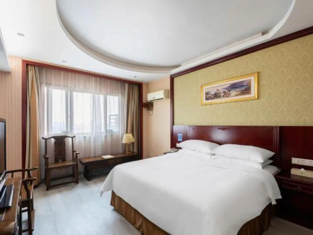 Bed in Vienna Hotel Yangzhou Yangzhou Slender West Lake Wenchangge