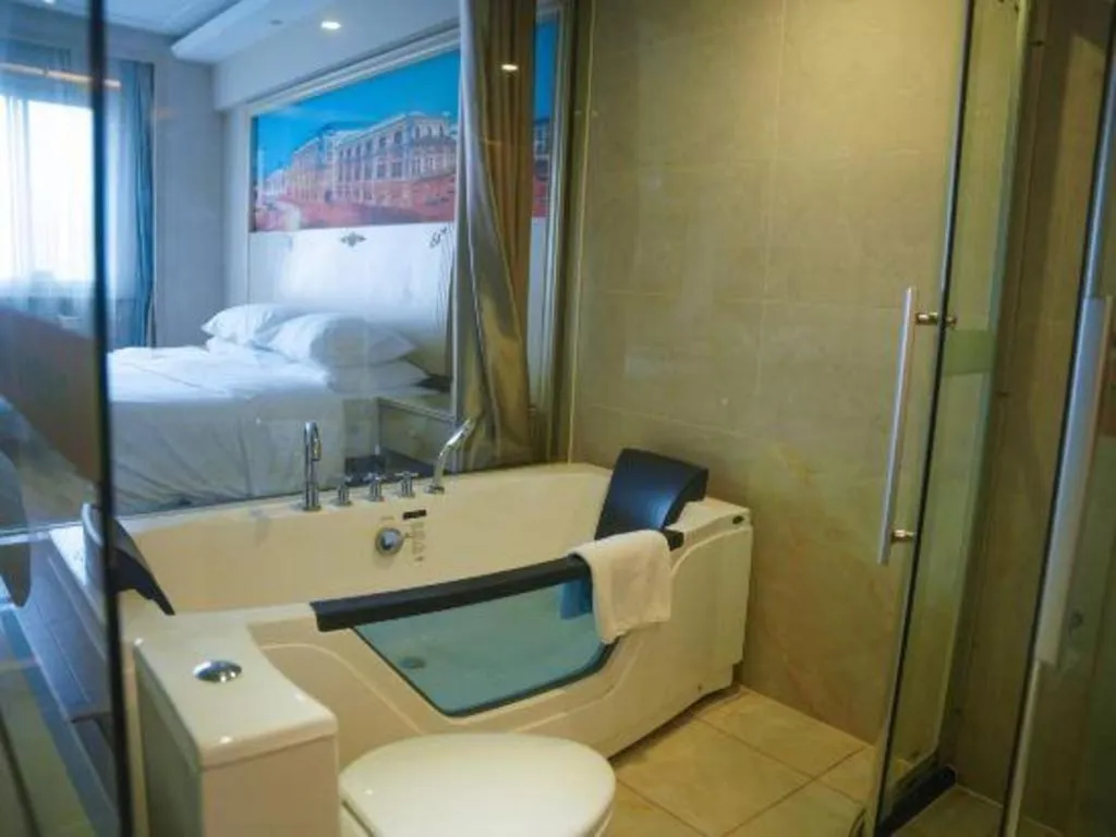 Bed in Vienna Hotel Yangzhou Yangzhou Slender West Lake Wenchangge