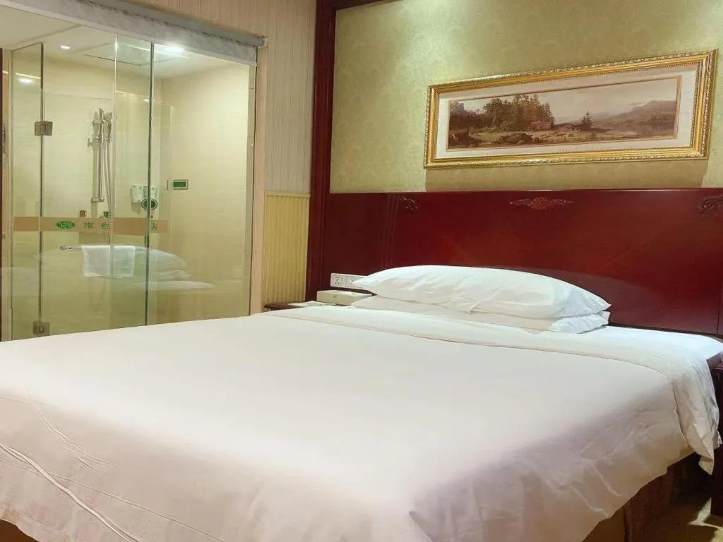 Bed in Vienna Hotel Yangzhou Yangzhou Slender West Lake Wenchangge