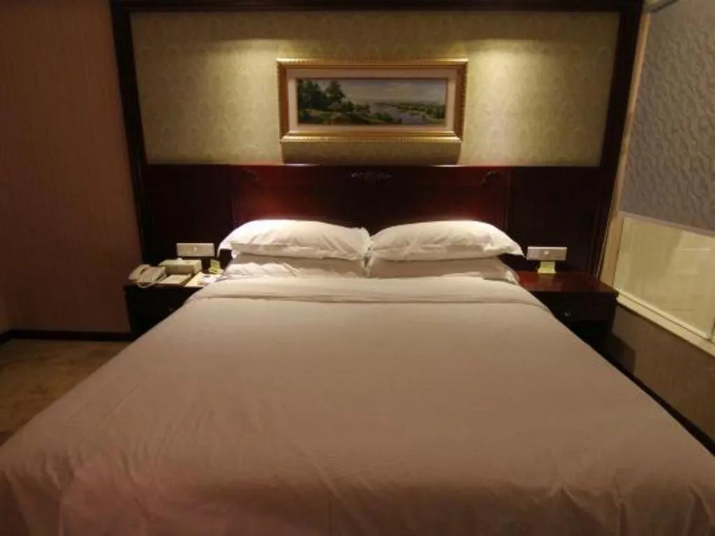 Bed in Vienna Hotel Yangzhou Yangzhou Slender West Lake Wenchangge