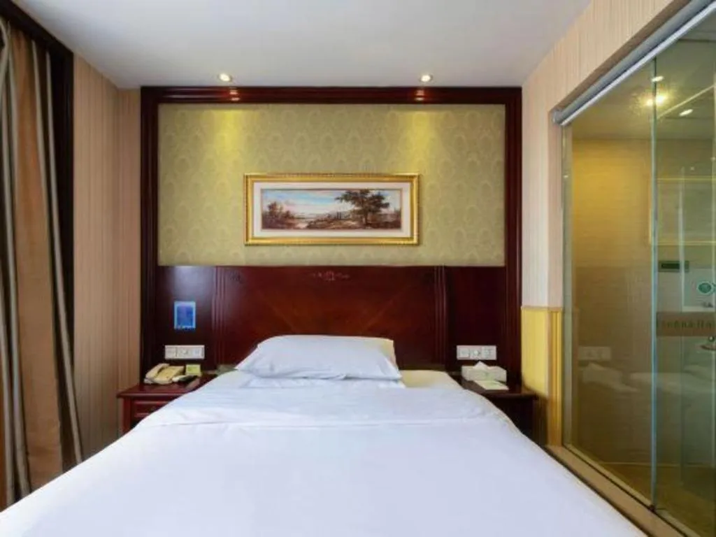 Bed in Vienna Hotel Yangzhou Yangzhou Slender West Lake Wenchangge