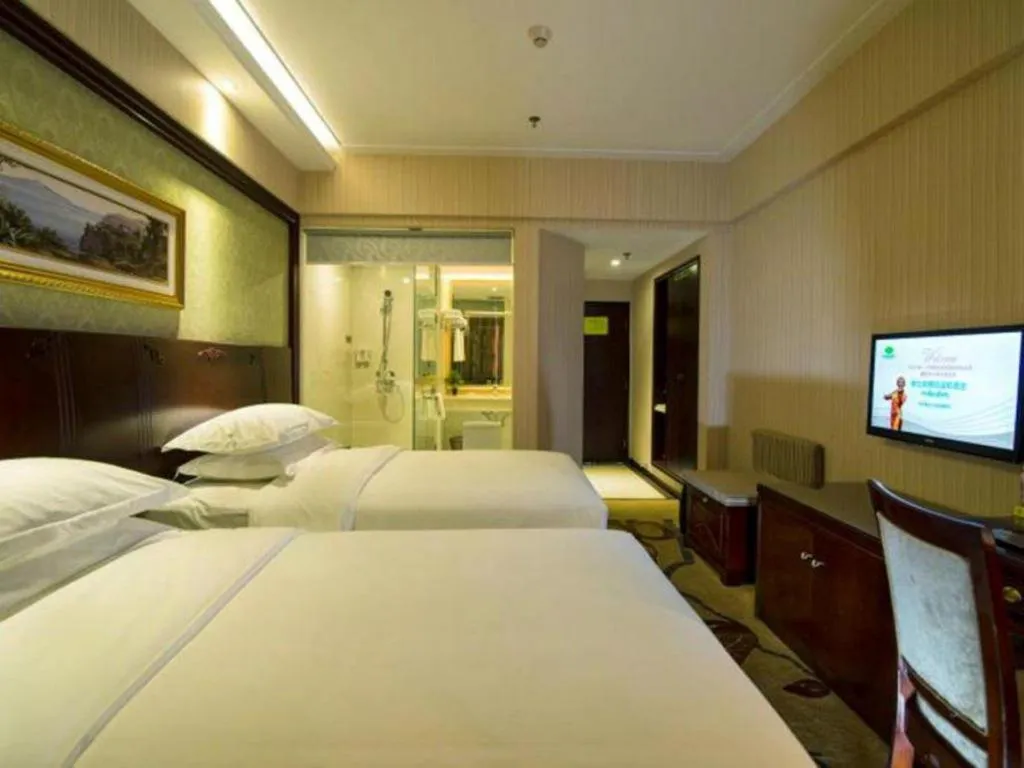 Bed in Vienna Hotel Yangzhou Yangzhou Slender West Lake Wenchangge