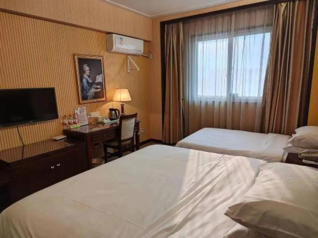 Bed in Vienna Hotel Yangzhou Yangzhou Slender West Lake Wenchangge