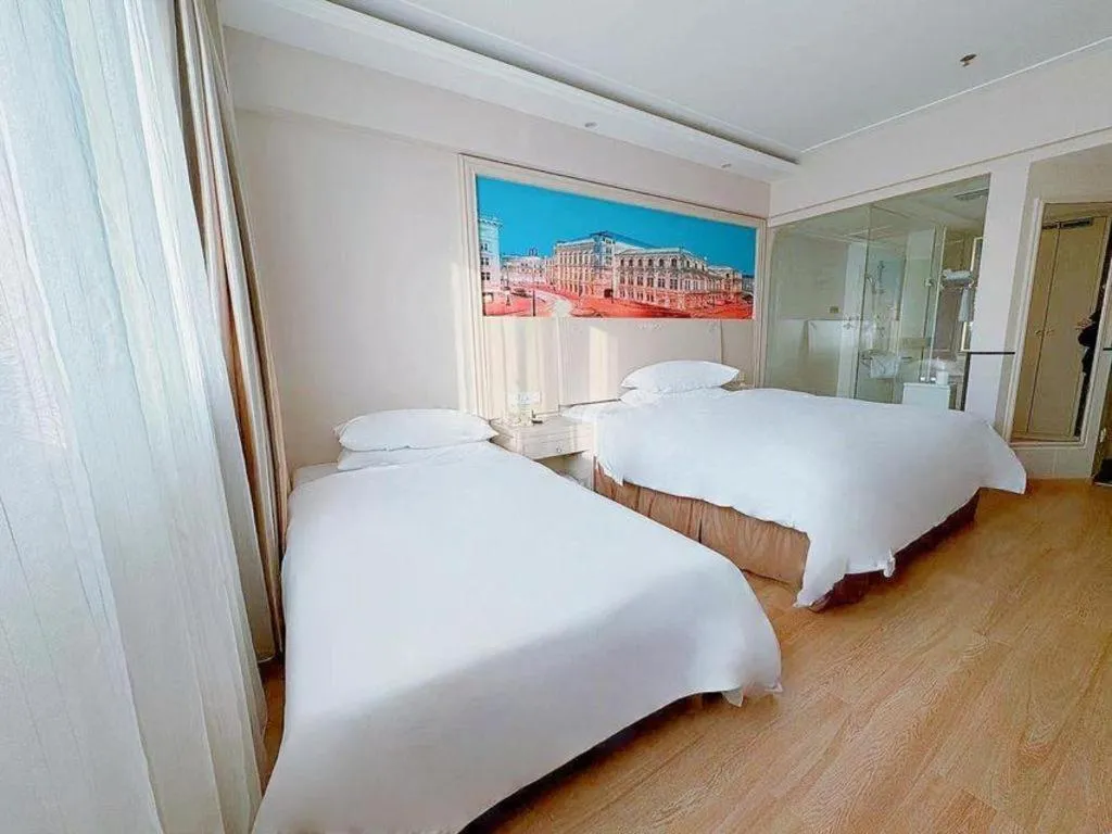 Bed in Vienna Hotel Yangzhou Yangzhou Slender West Lake Wenchangge