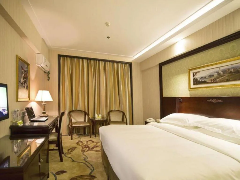 Bed in Vienna Hotel Yangzhou Yangzhou Slender West Lake Wenchangge