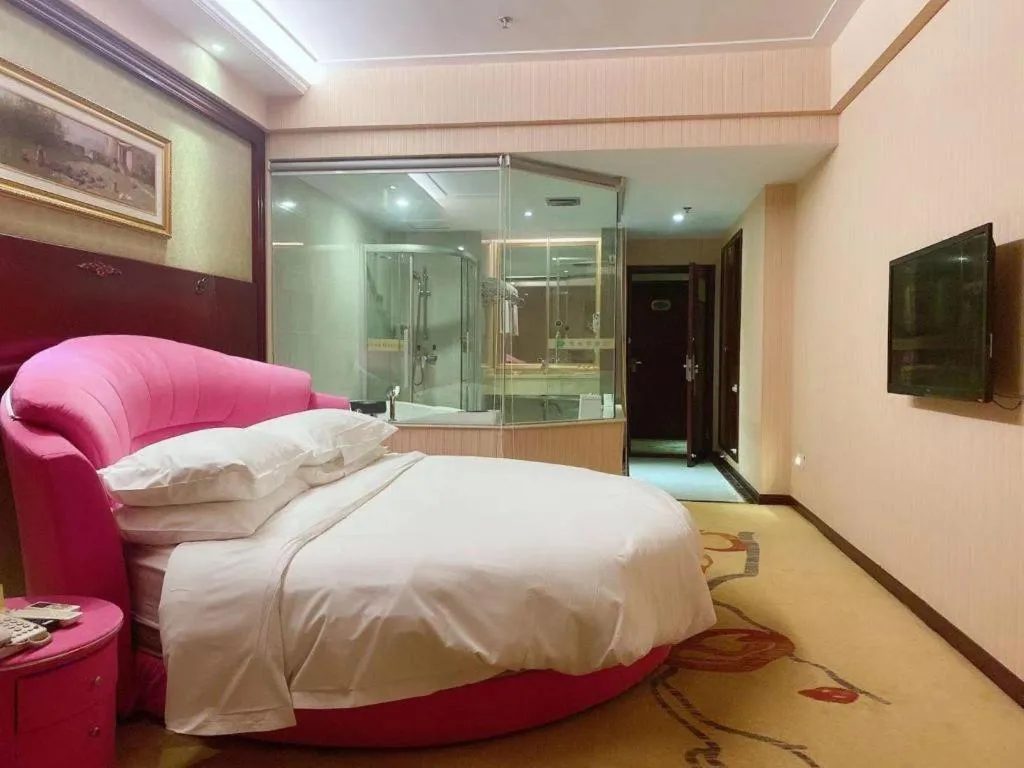 Bed in Vienna Hotel Yangzhou Yangzhou Slender West Lake Wenchangge