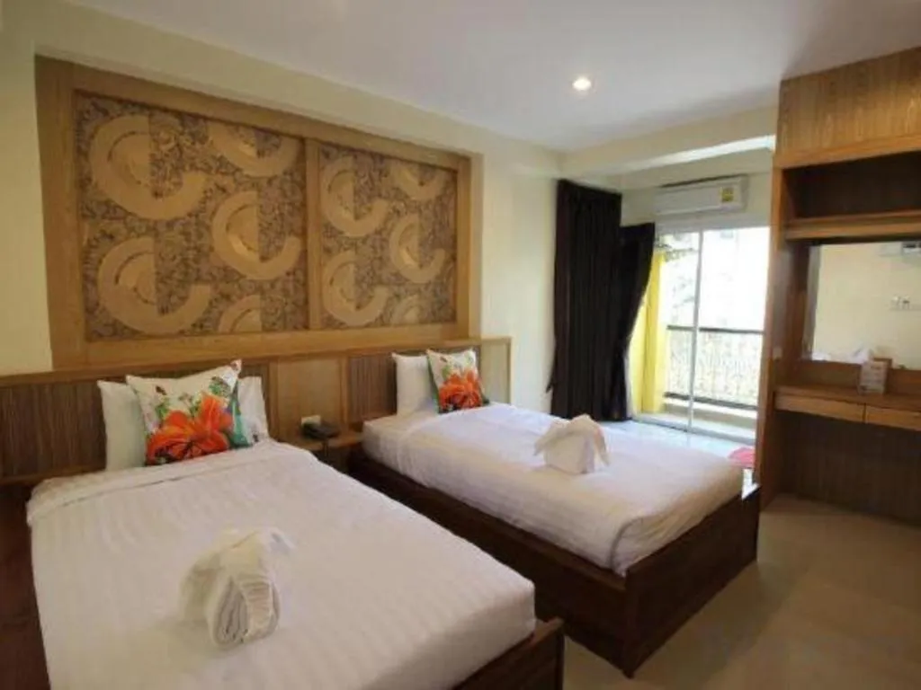 Bed in Mon Muang Hotel