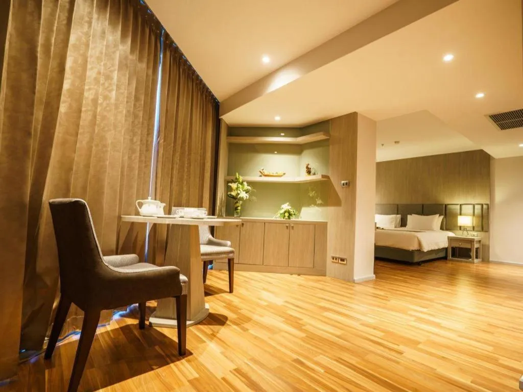 Bed in New Season Square Hotel