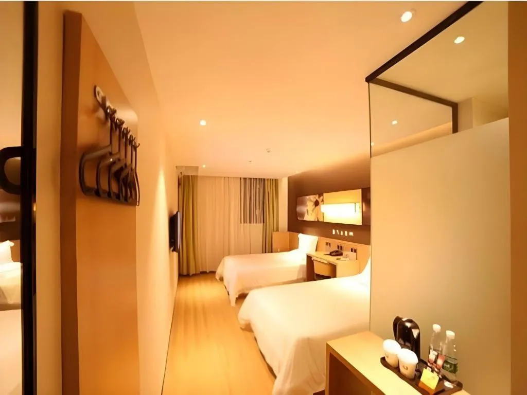 Bed in IU Hotel Guangzhou Taihe Square Branch