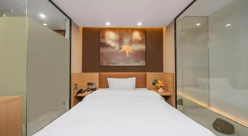 Bed in IU Hotel Guangzhou Taihe Square Branch