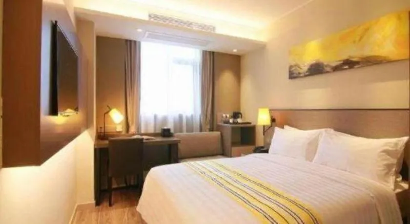 Bed in Home Inn Plus Shanghai Zhangjiang Guanglan Road Metro Station