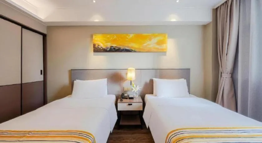 Bed in Home Inn Plus Shanghai Zhangjiang Guanglan Road Metro Station