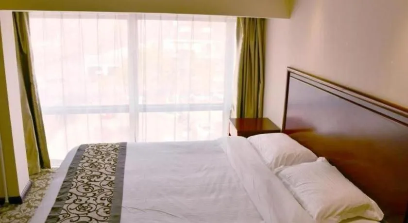 Bed in GreenTree Inn Tianjin JinNan ShuangLin Metro Station Express Hotel