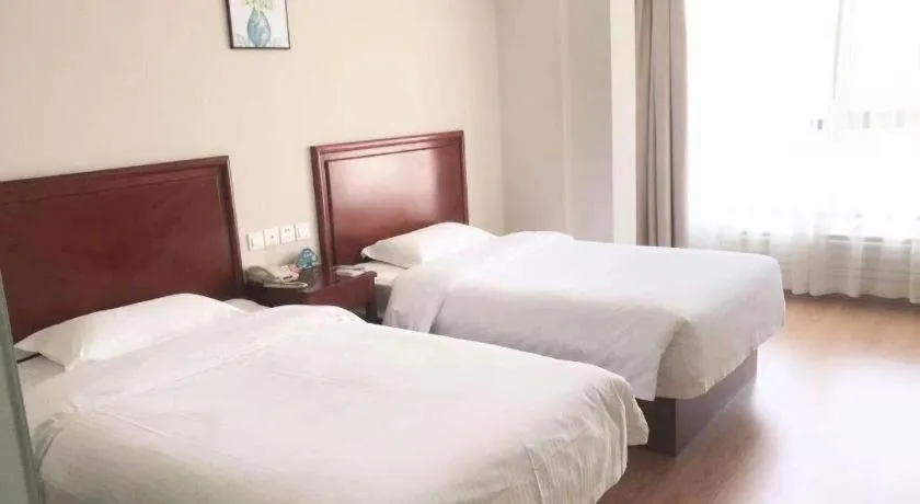 Bed in GreenTree Inn Tianjin JinNan ShuangLin Metro Station Express Hotel