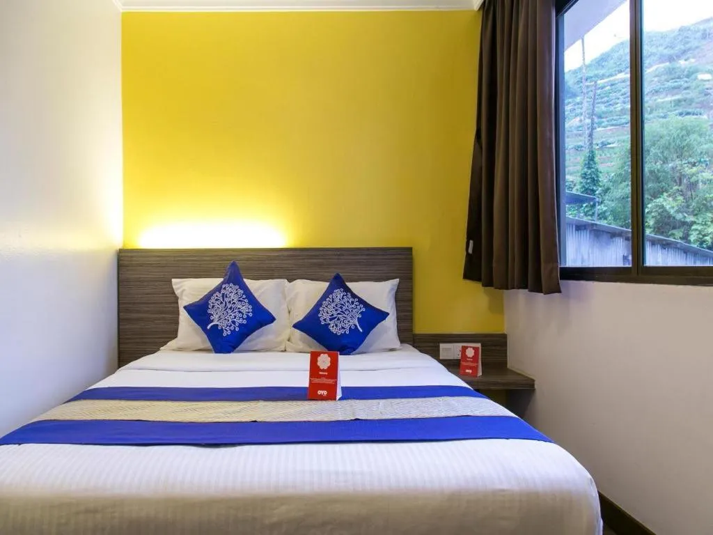 Bed in OYO 229 Parkland Hotel