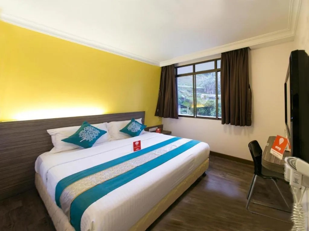 Bed in OYO 229 Parkland Hotel