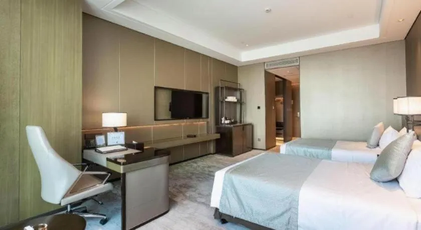 Bed in Golden Eagle Summit Hotel Kunshan