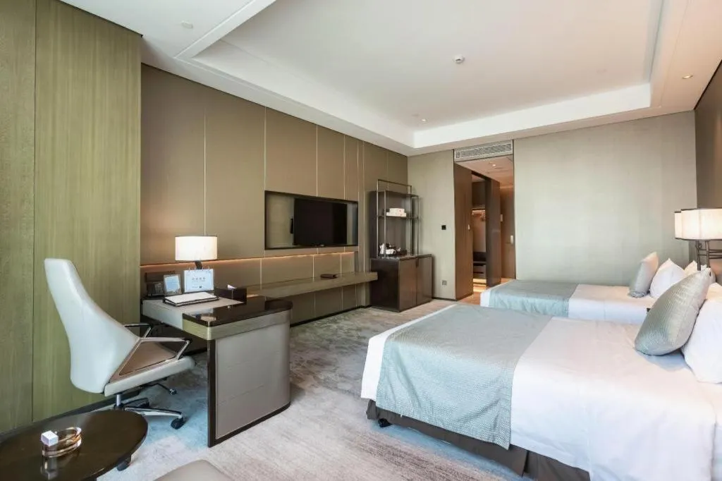 Bed in Golden Eagle Summit Hotel Kunshan