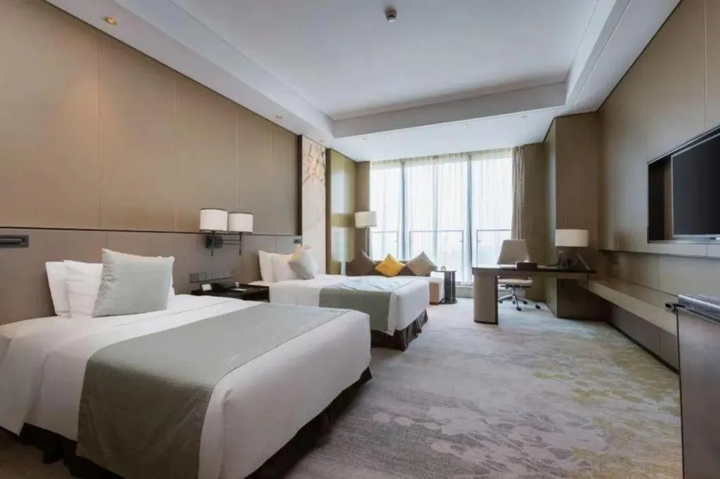 Bed in Golden Eagle Summit Hotel Kunshan