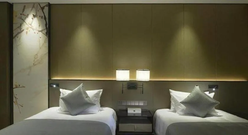 Bed in Golden Eagle Summit Hotel Kunshan