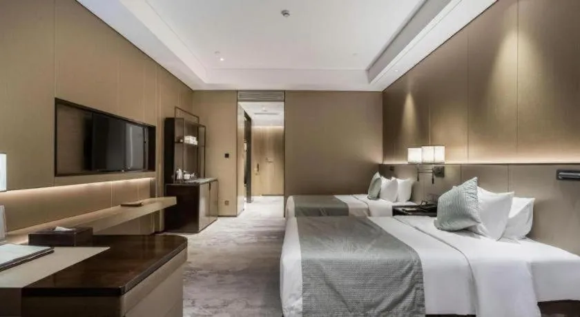 Bed in Golden Eagle Summit Hotel Kunshan