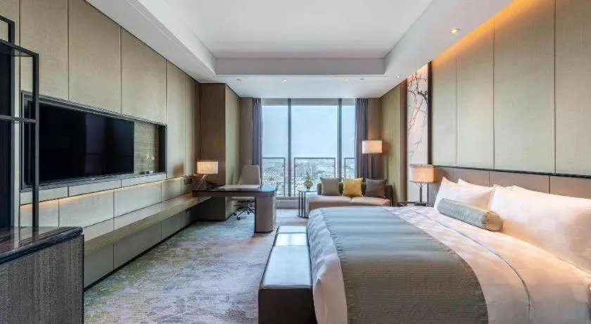 Bed in Golden Eagle Summit Hotel Kunshan