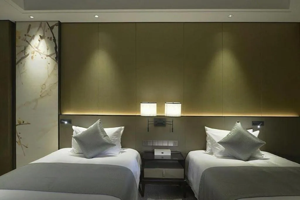 Bed in Golden Eagle Summit Hotel Kunshan