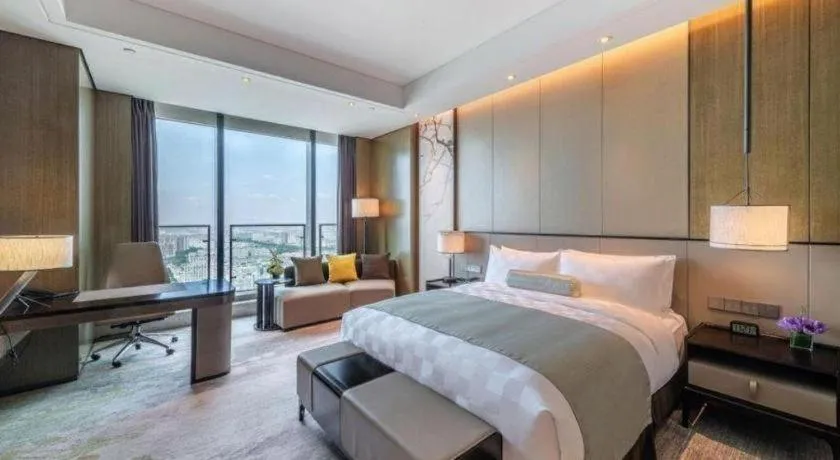 Bed in Golden Eagle Summit Hotel Kunshan