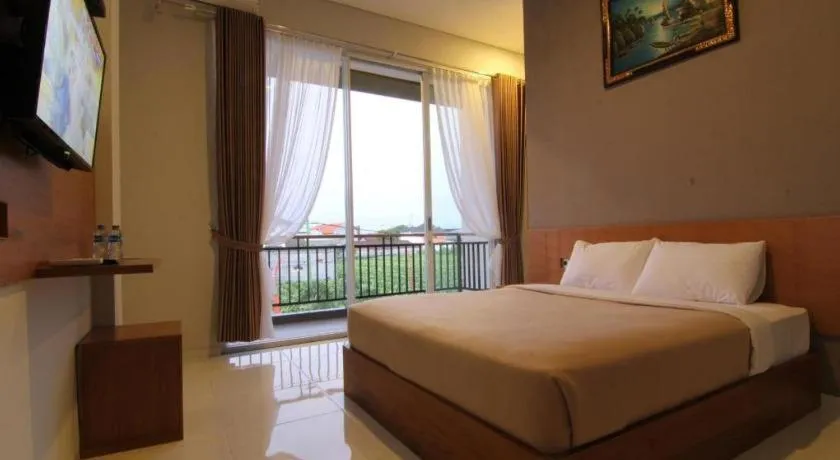 Bed in MANDARI HOTEL SINGARAJA