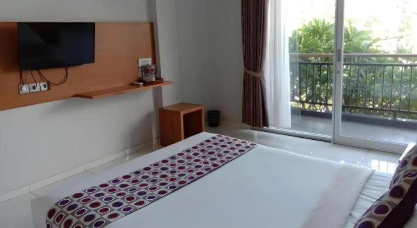 Bed in MANDARI HOTEL SINGARAJA